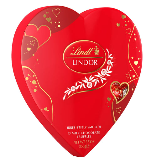 Remind friends or loved ones of how much they mean to you this Valentine's Day with Lindt LINDOR Valentine's Milk Chocolate Truffles Heart. Packaged in a festive heart shaped box, these milk chocolate candy truffles make a thoughtful gift on their own or the perfect pairing with flowers or a bottle of wine for that special someone. Finely crafted with a delicate milk chocolate shell that envelops an irresistibly smooth milk truffle filling, Lindt LINDOR truffles deliver the ultimate chocolate experience. Th