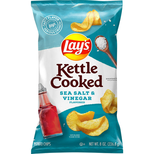 With the satisfying blend of delicious sea salt and tangy vinegar, these mouthwatering chips are ready for your enjoyment. Lay's Kettle Cooked Potato Chips, Sea Salt & Vinegar (8 oz bag) offer a delightful crunch with a perfect balance of tangy vinegar and savory sea salt. Each chip is kettle-cooked for a thicker texture, delivering an extra crispy bite. Ideal for snacking on their own or pairing with your favorite dips, these chips bring a bold flavor to any occasion.i