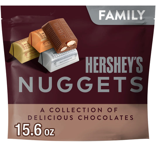 This HERSHEY'S NUGGETS candy assortment is filled with delicious assorted chocolate treats any chocolate lover will adore. It includes a variety of scrumptious candies that are the perfect size for snacking. Dress your kitchen table up with a bowl of HERSHEY'S NUGGETS goodies, surprise your co-workers with a filled candy dish or drop a handful of these treats into a party bag for an instant, anytime gift. This chocolate variety pack includes HERSHEY'S NUGGETS SPECIAL DARK chocolate with almonds candy, HERSH