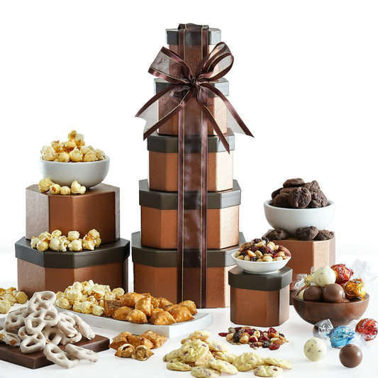 Express your best wishes and impress friends, family, clients, and associates by sending a shimmering Gift Tower of Sweets from Broadway Basketeers. Each box in this five-box tower is filled with a gourmet spread of treats to please all palates. The elegant, hand-crafted gift comes tied with a ribbon