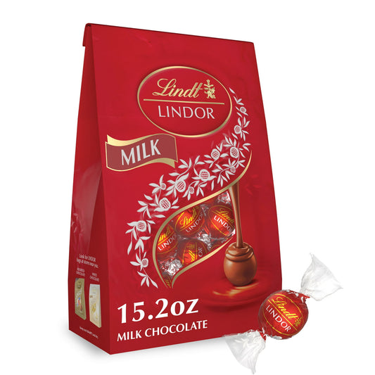 Experience smooth, melting chocolate indulgence in Lindt LINDOR Milk Chocolate Truffles. This bag of chocolates makes every day a special occasion, whether you're taking a moment to yourself or sharing with others. Finely crafted with a premium milk chocolate shell, these milk chocolate candy truffles feature irresistibly smooth, melting centers for the ultimate chocolate experience. These individually wrapped truffles are the perfect size to enjoy anytime, anywhere. Lindt chocolate embodies the passion and