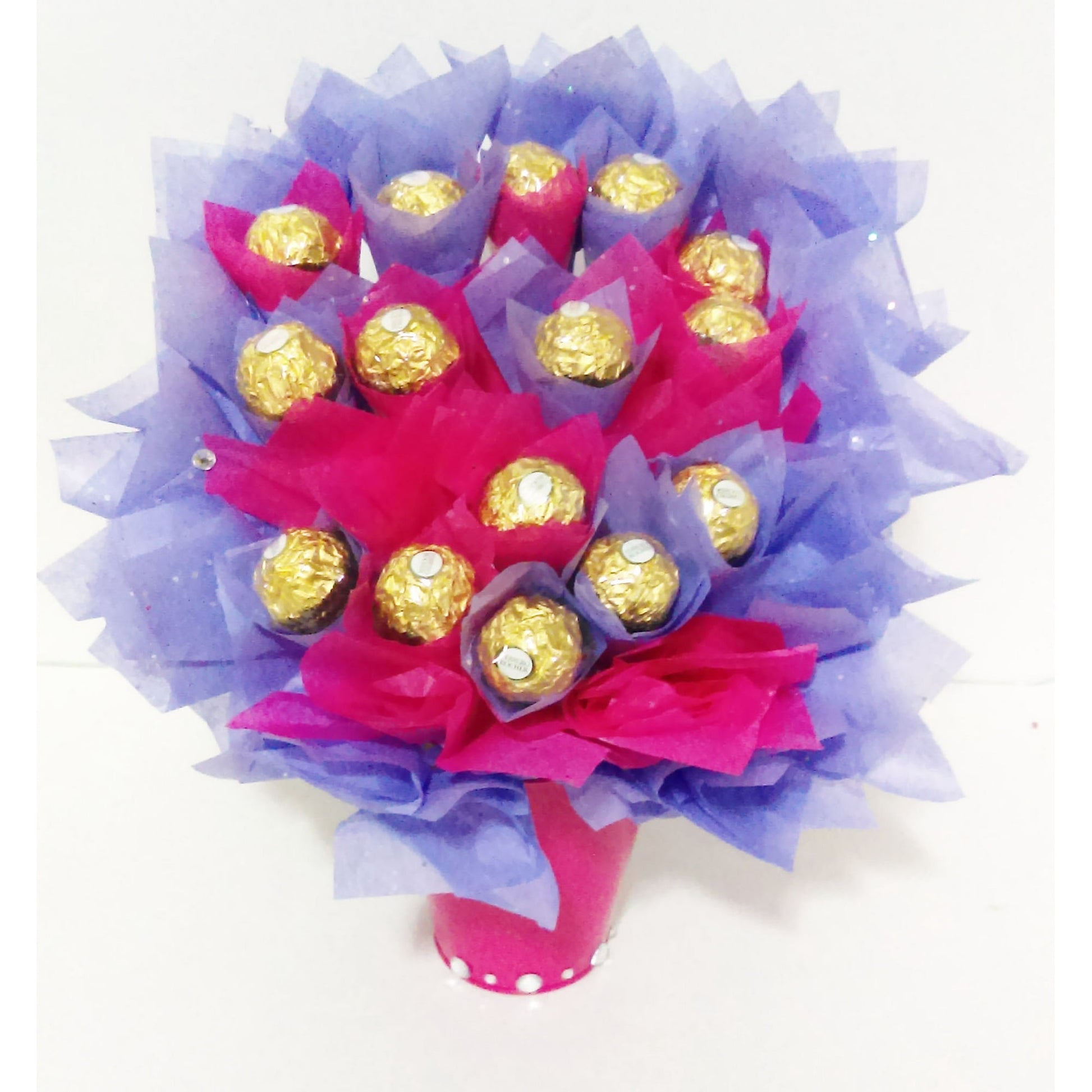 Send this gourmet chocolate bouquet to your favorite chickadee. The Ferrero Rocher treats are accentuated