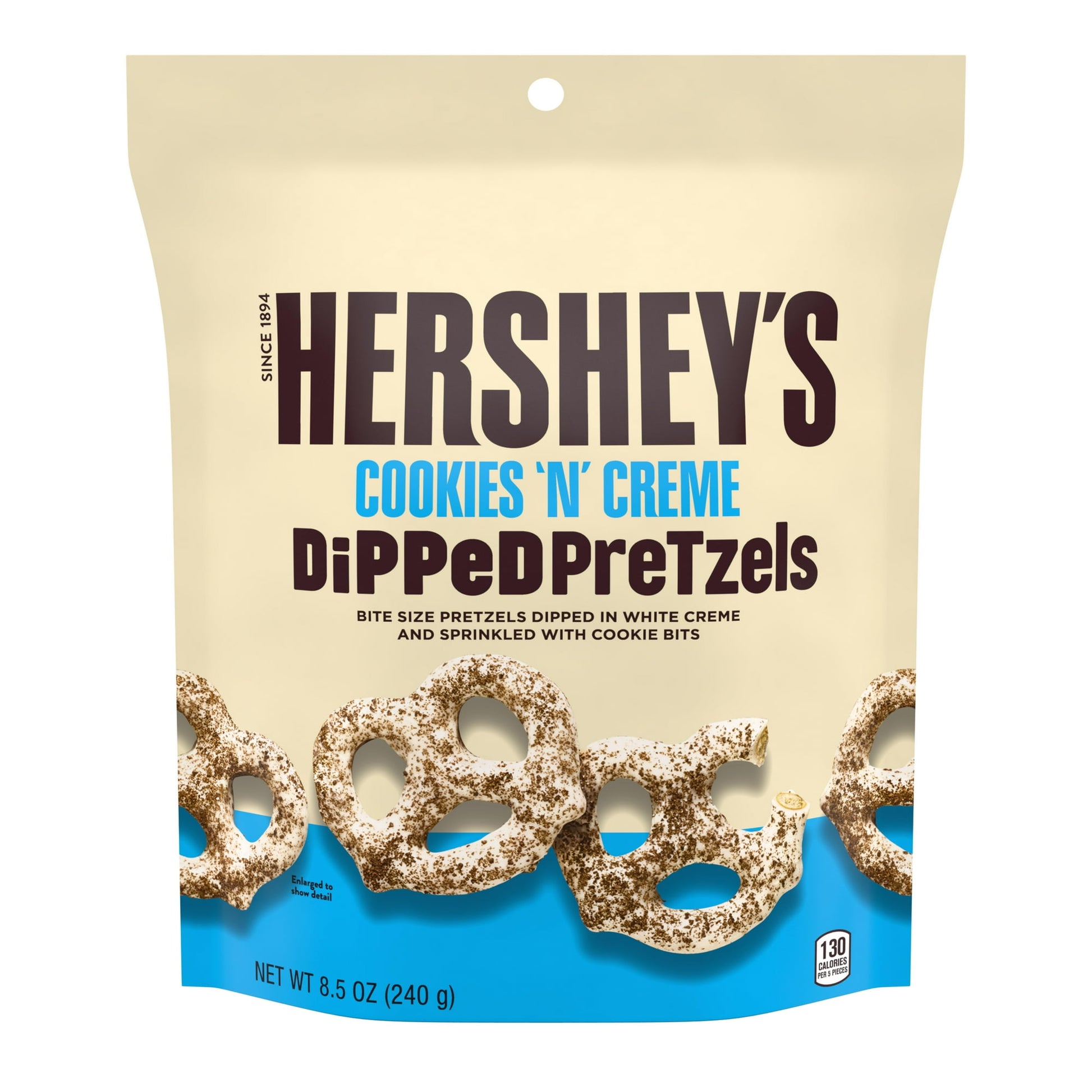 Snacking just got better! Bite size pretzels are dipped in creamy HERSHEY'S White Creme and sprinkled with cookie bits. Grab a handful and get snacking!