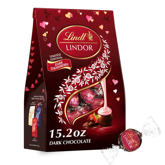 Remind friends or loved ones of how much they mean to you this Valentine's Day with Lindt LINDOR Strawberry Dark Chocolate Truffles. Packaged in a festive pink bag, these dark chocolate candy truffles are the perfect indulgence, and make a thoughtful gift on their own or the perfect pairing with flowers or a bottle of wine for your special someone. Inspired by dark chocolate covered strawberries, these Lindt LINDOR truffles are finely crafted with a delicate dark chocolate shell that envelops an irresistibl