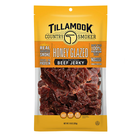 Indulge in our Honey Glazed Beef Jerky, crafted the traditional way. We start with 100% premium beef, seasoned with simple, recognizable ingredients, and slow-smoked over real hardwood. Our Honey Glazed flavor is the perfect balance of sweet and savory—neither too intense nor too mild, just right every time. This jerky is a delightful treat for any occasion, offering a satisfying and flavorful snack experience. Enjoy this delicious jerky, proudly made in Tillamook County, Oregon, USA.