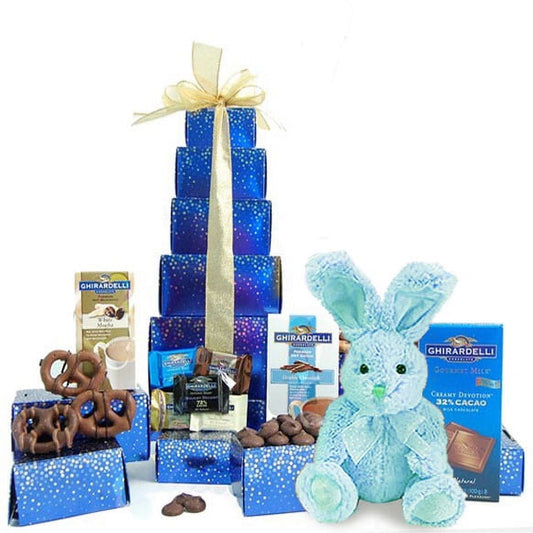 An assortment of delectable chocolates completes this gift basket. Gift Tower includes: Assortment of Ghirardelli squares, 2 Asher?s Dark Chocolate Pretzels, 2 bags of chocolate chip cookies, 1 Godiva Dark Chocolate Almonds or 1 Godiva Milk Cashews, 3.5-ounces extra-large chocolate bar