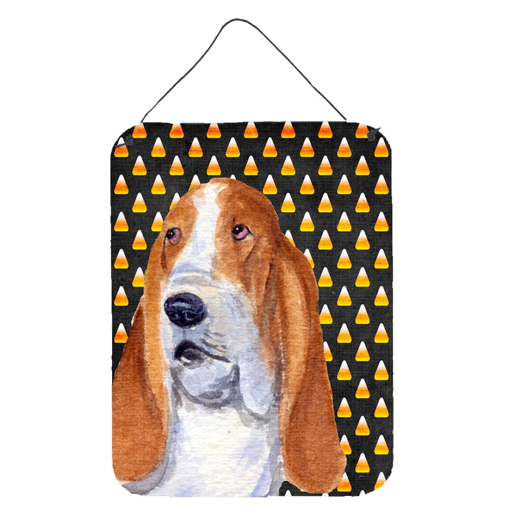 Basset Hound Candy Corn Halloween Portrait Wall or Door Hanging Prints Wall or Door Hanging Prints featuring breed specific Basset Hound artwork from one of our artists or graphic designers. Celebrate the Halloween holiday with this Halloween decorative Metal Print. This Wall or Door Hanging Prints is from Carolines Treasures collection Candy Corn Halloween. Indoor or Outdoor Aluminum multicolor artwork prints will add a special touch to your kitchen bath front door office outdoor patio porch or any other s