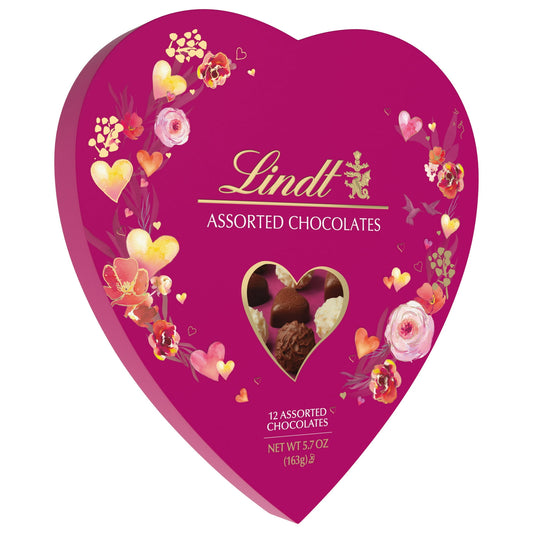 The Lindt Valentine's Gourmet Heart Chocolate Truffles come in a beautifully designed 5.7 oz. heart-shaped box. Share the love with someone special with this perfect Valentine’s gift, containing 12 indulgent assorted chocolates. Lovingly crafted by our Master Chocolatiers using premium ingredients from world-renowned regions, this box is perfect for a romantic evening at home or as a surprise gift. Show your love and appreciation this Valentine's Day with the exquisite taste of Lindt Gourmet Truffles. *Info