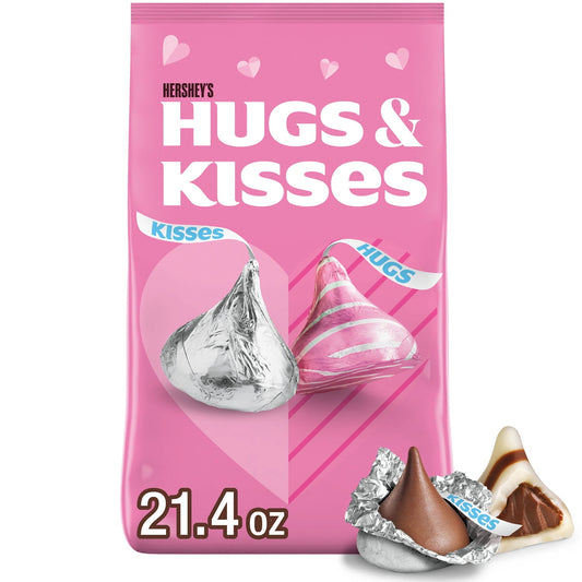 This HERSHEY'S HUGS & KISSES Valentine's Day milk chocolate and white creme candy assortment includes two delicious, creamy chocolate treats. HERSHEY'S HUGS candies are a delectable combination featuring HERSHEY'S milk chocolate hugged by sweet white creme, and HERSHEY'S KISSES candies are the classic milk chocolate treats you already know and love. Gift these bite size chocolates to a loved one or treat yourself at home, at work, or on the go. Individually wrapped in festive pink and silver foils and place