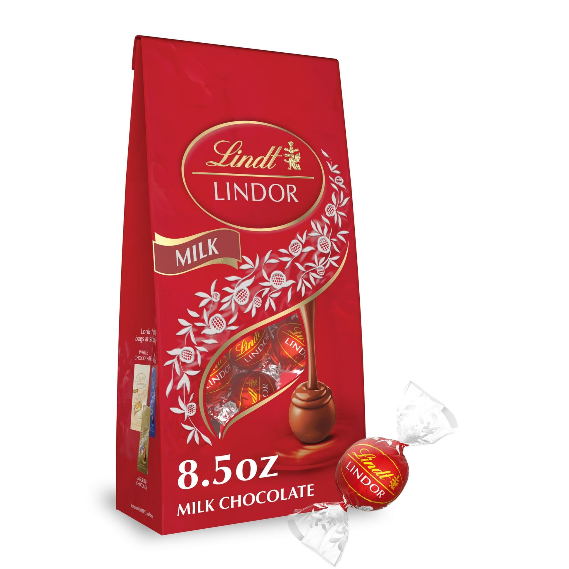 Experience the ultimate chocolate indulgence with irresistibly smooth Lindt LINDOR Milk Chocolate Truffles. Whether celebrating with colleagues, relaxing with family or savoring time to yourself, these fine Lindt LINDOR Chocolate Truffles are an elegant accompaniment to all of life’s little moments. Classic milk chocolate flavor fills the delicate chocolate shell and smooth, melting milk truffle center for an indulgent treat. When you break the shell, the truffle's smooth, luscious center begins melting and