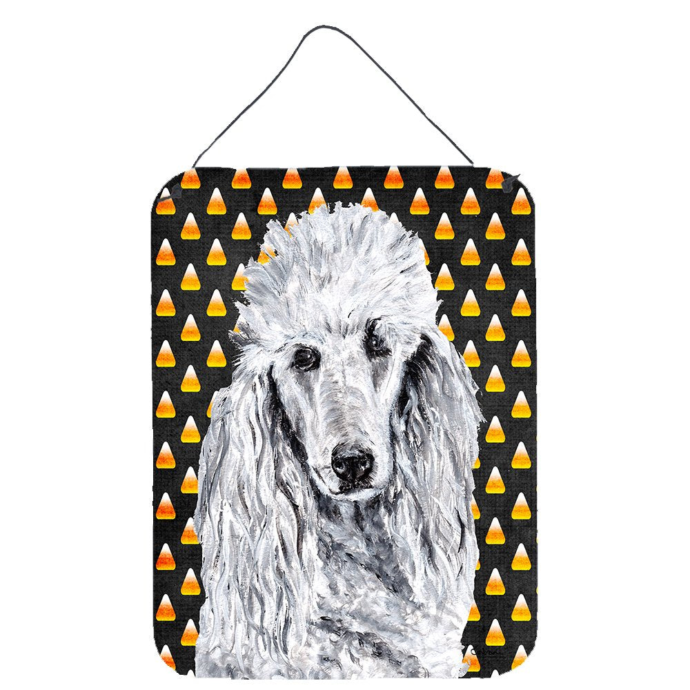 White Standard Poodle Candy Corn Halloween Wall or Door Hanging Prints Wall or Door Hanging Prints featuring breed specific Poodle artwork from one of our artists or graphic designers. Celebrate the Halloween holiday with this Halloween decorative Metal Print. This Wall or Door Hanging Prints is from Carolines Treasures collection Candy Corn Halloween. Indoor or Outdoor Aluminum multicolor artwork prints will add a special touch to your kitchen bath front door office outdoor patio porch or any other special