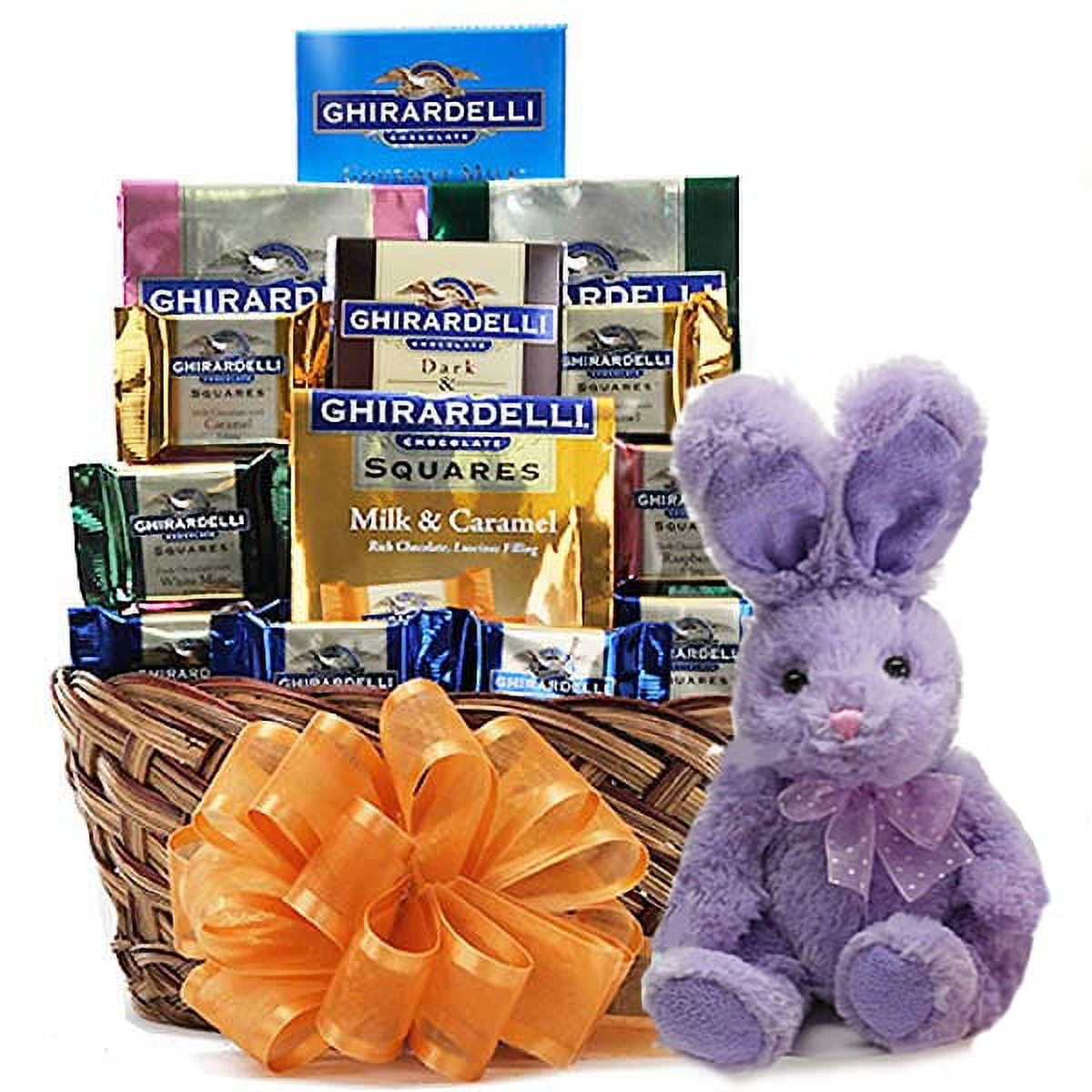 The Easter Ghirardelli Chocolate Gift Basket is a premium chocolate assortment meant for true connoisseurs crafted by the world famous Ghirardelli. This basket features a variety of chocolates in different flavors and sizes; (3) 5.32 oz. Square Bags Dark & Raspberry, Milk & Caramel, Mint & Dark, (4) .53 oz. Square Chocolates, 3.5 oz. Creamy Devotion Bar 32% Cocao, 3.5 oz. Dark & Caramel Bar. Includes a 8 inch bunny rabbit.