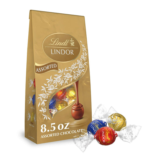 Experience the most popular flavors of Lindt LINDOR Assorted Chocolate Truffles in this classic three flavor chocolate assortment. Surprise friends and family with a chocolate candy gift, or enjoy Lindt LINDOR chocolate truffles as a sweet, indulgent after-dinner treat. Each bag features Milk Chocolate, White Chocolate and Dark Chocolate truffles. There is something for everyone, whether you prefer classic Milk Chocolate truffles, slightly intense Dark Chocolate truffles or smooth and sweet White Chocolate 