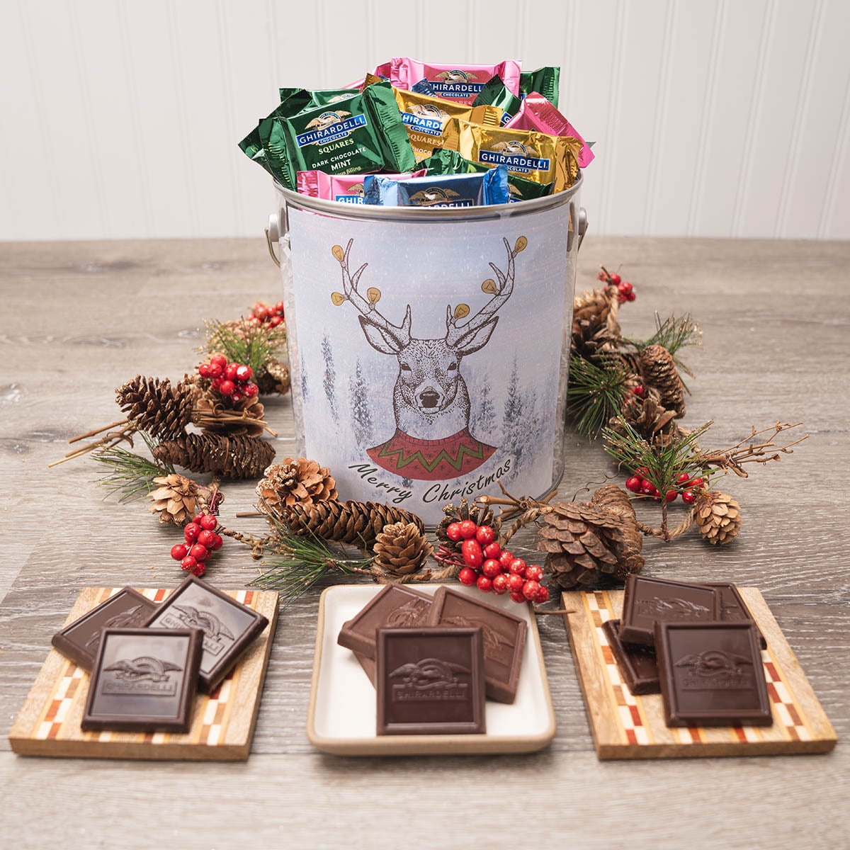 Run, Run Rudolph Chocolate Gift Tin is a perfect way to show someone that you care. Included in this amazing gift is a 30 piece assortment of delicious Ghirardelli squares. Flavors include but are not limited to Milk Chocolate, Dark Chocolate Sea Salt Caramel, Limited-Edition Peppermint & Dark Chocolate. Perfect for sharing, this gift will be enjoyed by all!